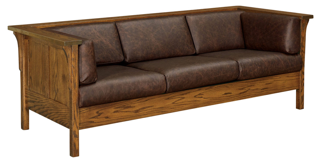 Brown leather sofa with wooden frame on a white background