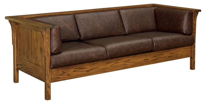 Brown leather sofa with wooden frame on a white background