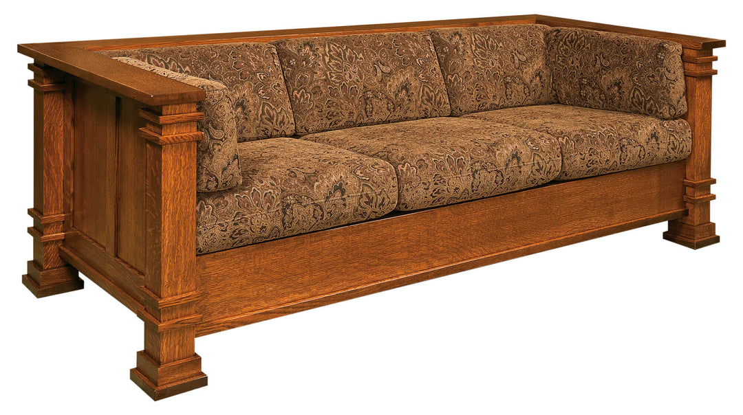 Wooden sofa with patterned cushions on a white background