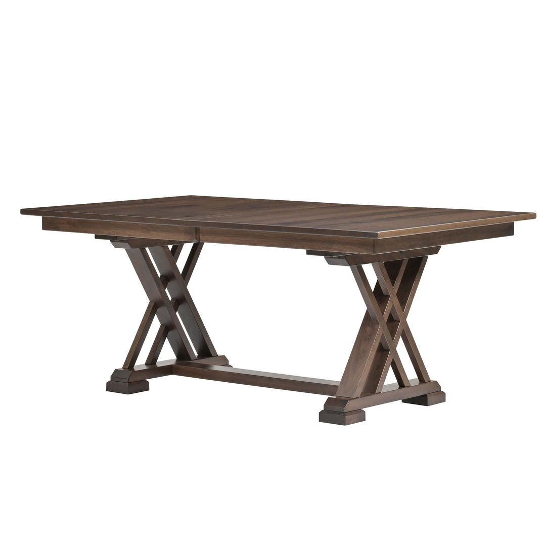 Wooden dining table with X-shaped legs on a white background