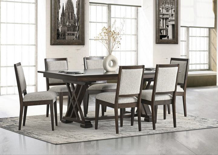 Dining room with a wooden table and chairs in a well-lit room.