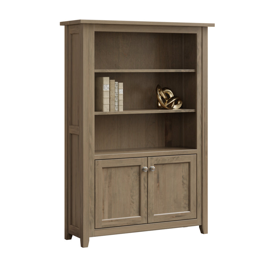 Wooden bookshelf with two open shelves and two closed doors on a white background