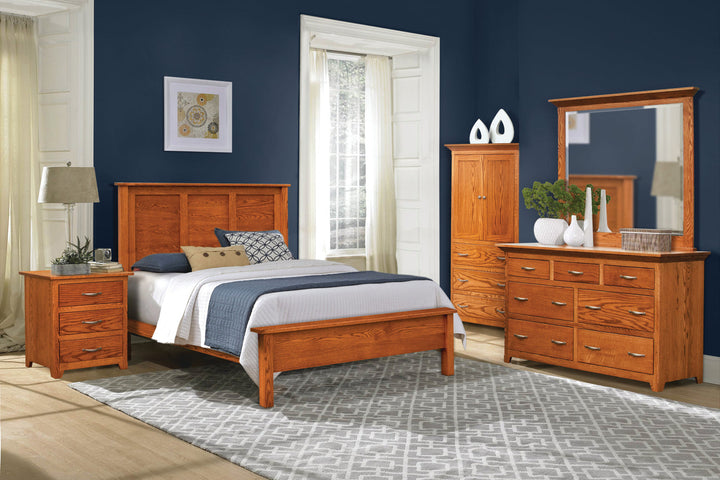Wooden bedroom furniture set with bed, nightstand, dresser, and mirror against a blue wall.