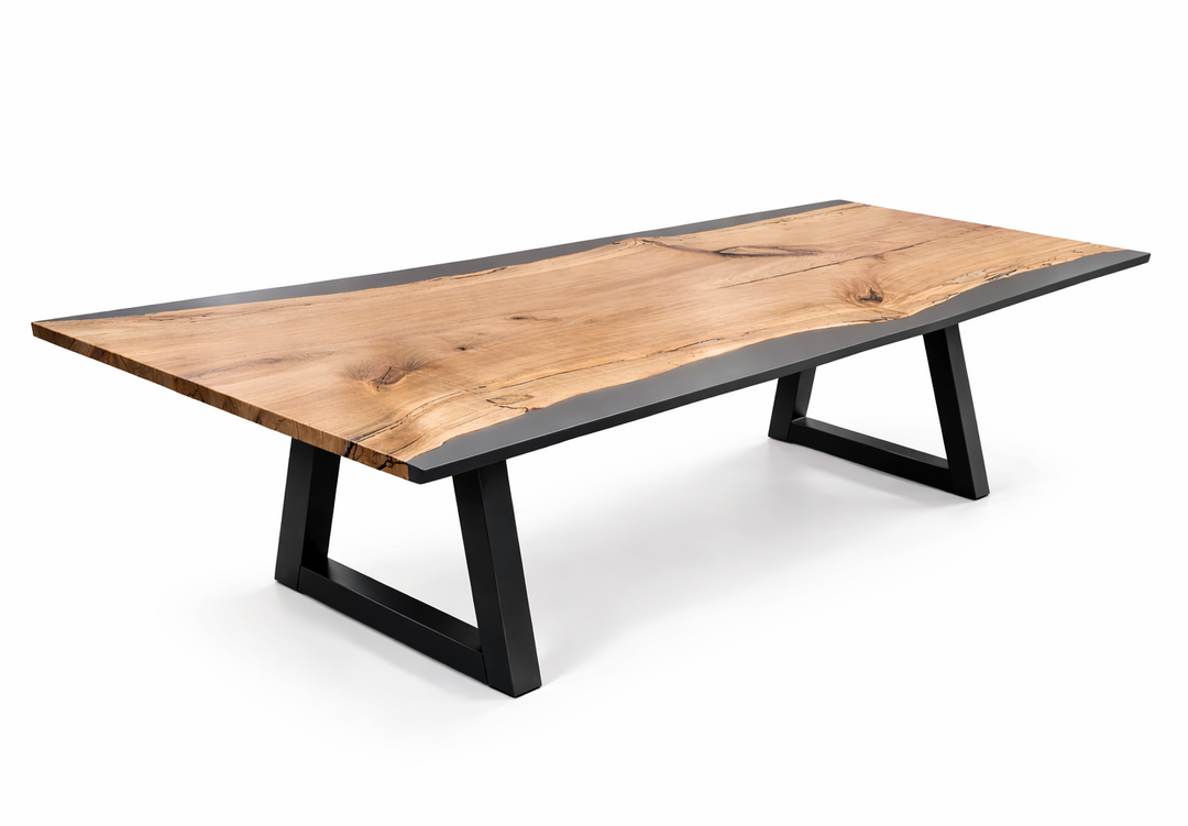 Wooden dining table with black metal legs on a white background